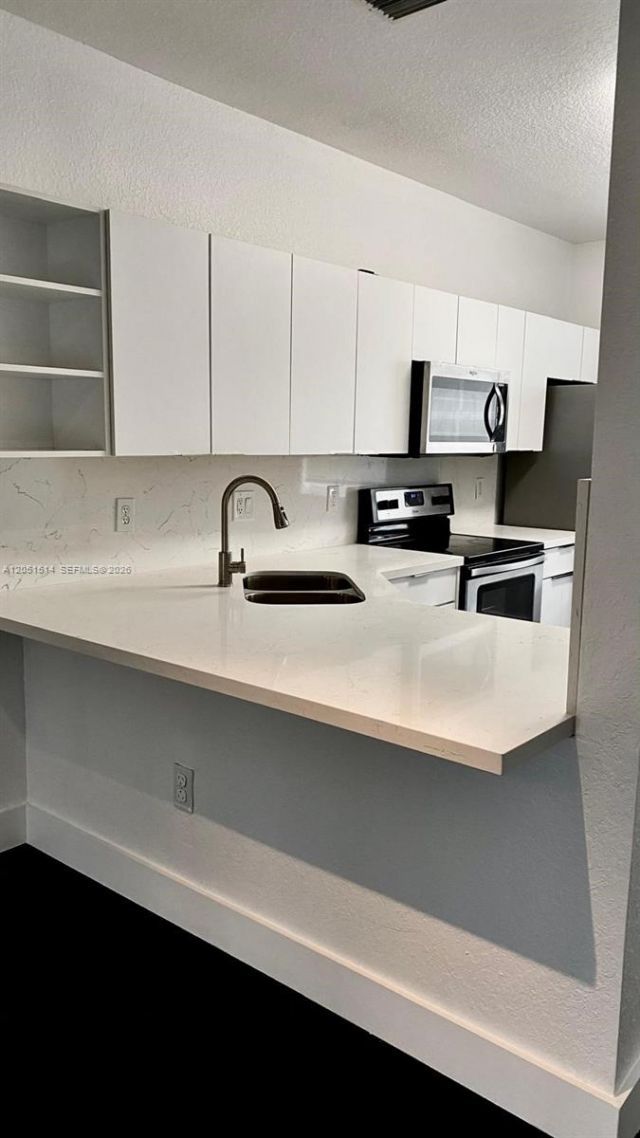 5670 NW 116th Ave, Unit 216, Doral, FL 33178 Photo