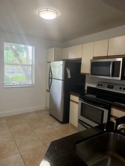 8821 Wiles Rd , Unit 107, Coral Springs, FL 33067 Photo