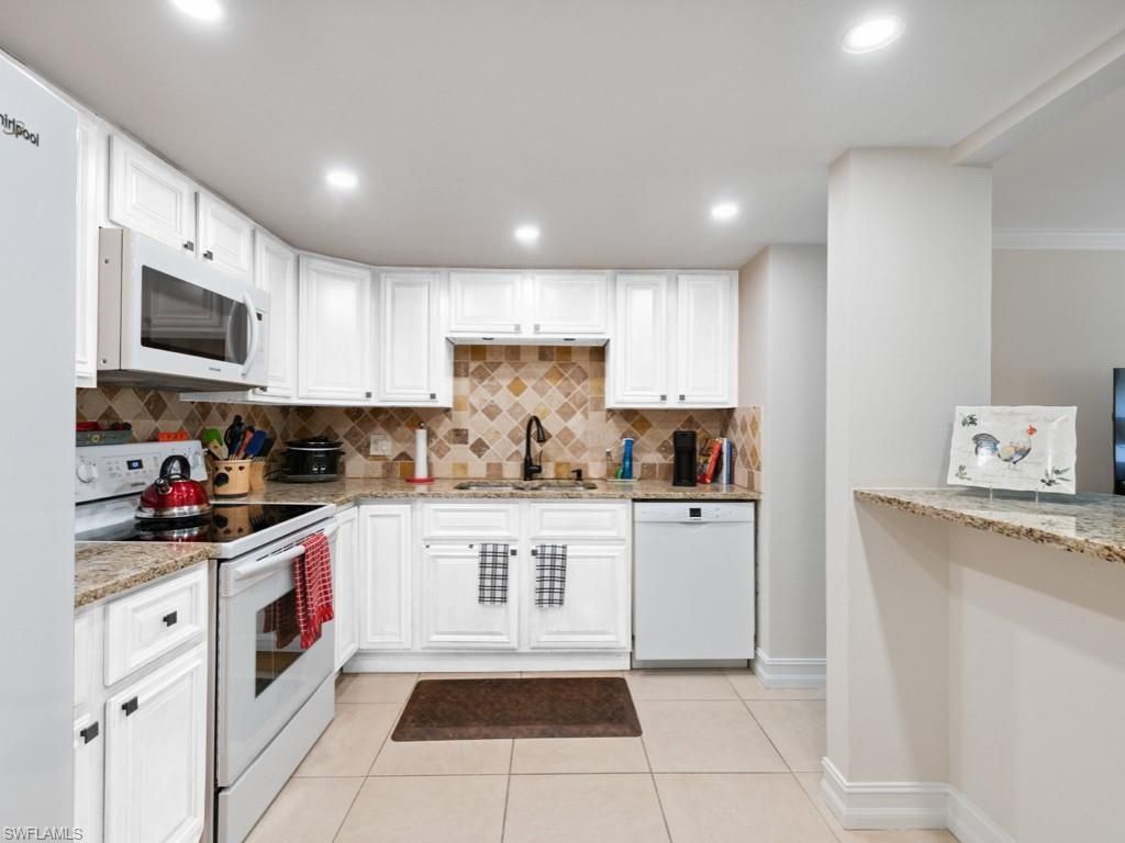 151 Cypress Way E, Unit E101, Naples, FL 34110 Photo