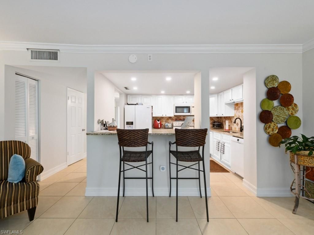 151 Cypress Way E, Unit E101, Naples, FL 34110 Photo