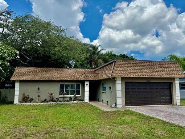 1011 WINDING OAKS DRIVE, PALM HARBOR, FL 34683