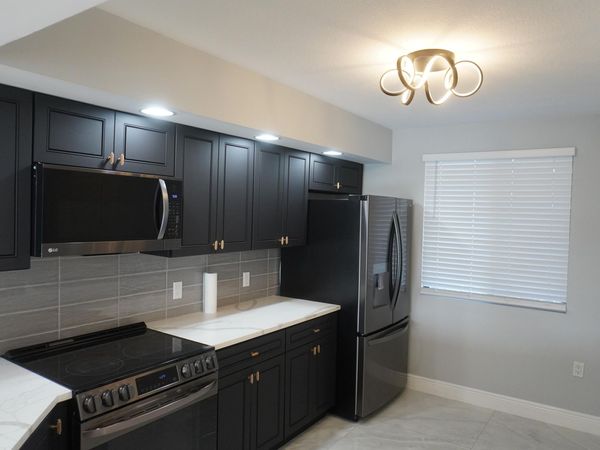 2811 Village Boulevard, Unit 201, West Palm Beach, FL 33409