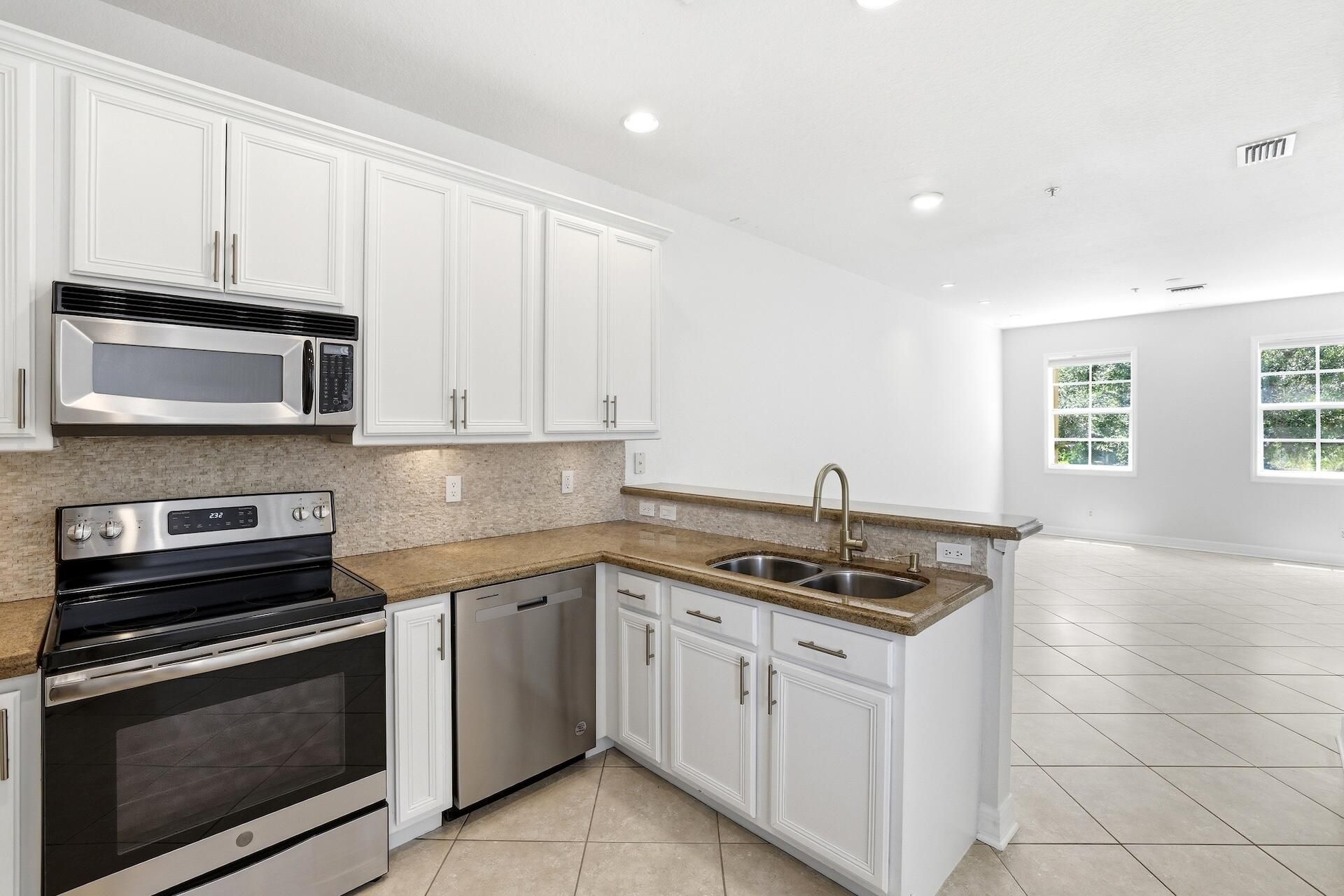 127 E Thatch Palm Circle, Jupiter, FL 33458 Photo