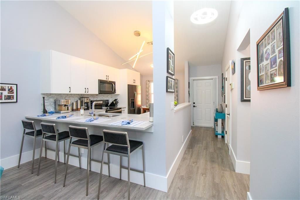 225 Robin Hood Cir, Unit 203, Naples, FL 34104 Photo