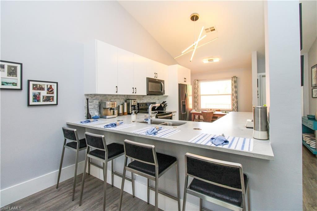 225 Robin Hood Cir, Unit 203, Naples, FL 34104 Photo