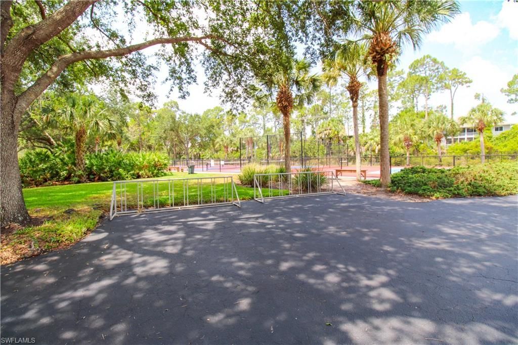 225 Robin Hood Cir, Unit 203, Naples, FL 34104 Photo