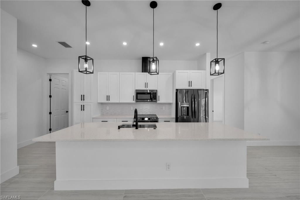 318 NW 9th St , Cape Coral, FL 33993 Photo