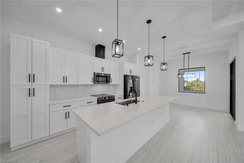 318 NW 9th St , Cape Coral, FL 33993 Photo