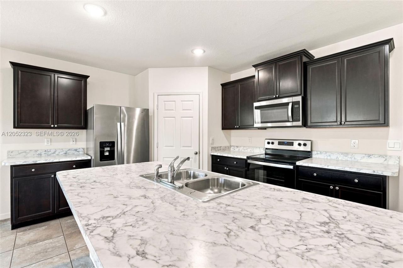 4650 SW Babylon St , Port Saint Lucie, FL 34953 Photo