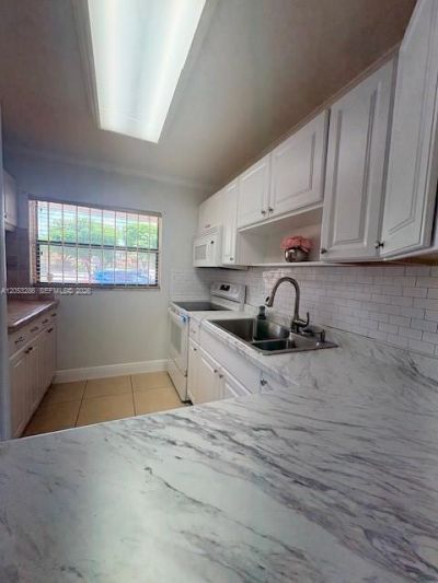 220 W Park Dr , Unit 104-3, Miami, FL 33172 Photo