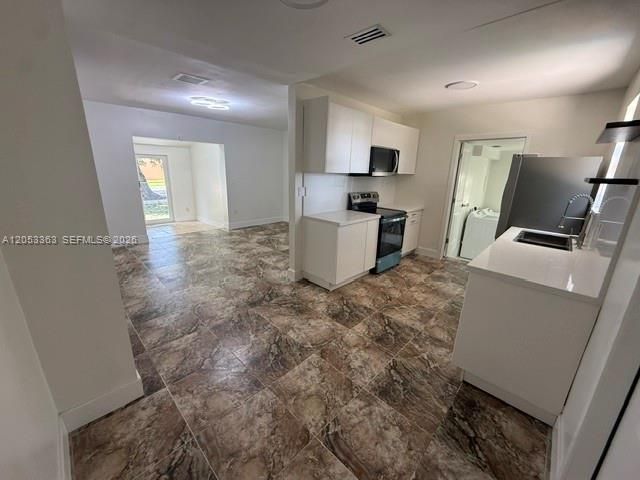 1121 NW 56th St , Miami, FL 33127 Photo