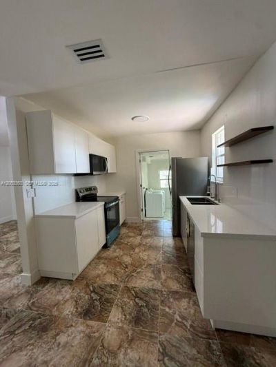 1121 NW 56th St , Miami, FL 33127 Photo