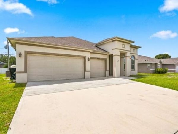1957 SW LOGAN Street, Port St. Lucie, FL 34953