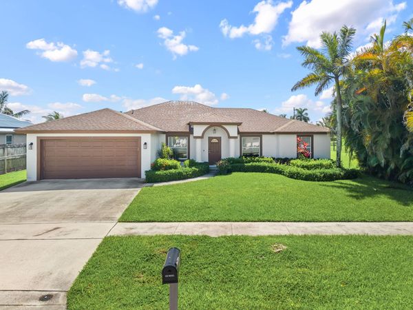 111 Meadow Woode Drive, Royal Palm Beach, FL 33411