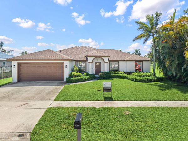111 Meadow Woode Drive, Royal Palm Beach, FL 33411