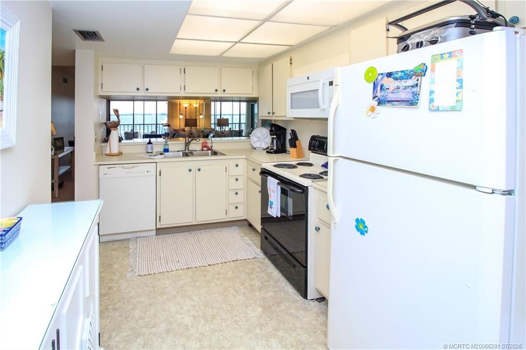 4540 NE Sandpebble Trace , Unit 203, Stuart, FL 34996 Photo