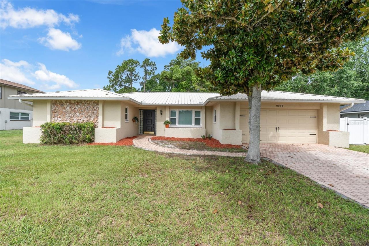 8208 Tansy Drive , Orlando, FL 32819 Photo