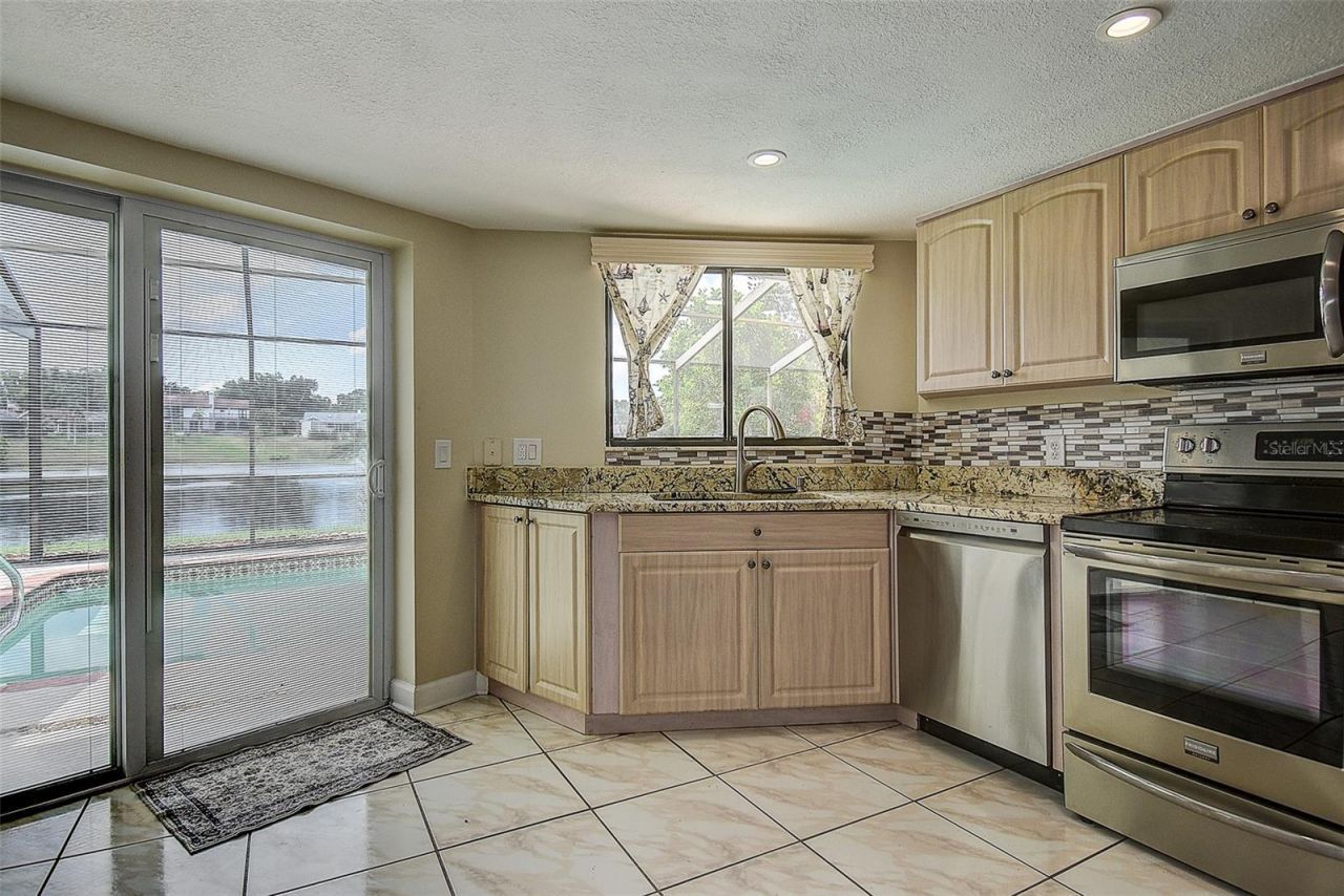 2876 Lake Valencia Boulevard E, Palm Harbor, FL 34684 Photo
