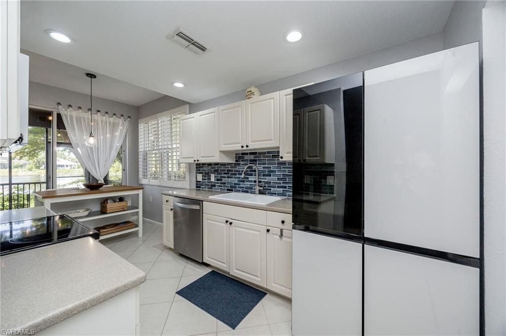 7098 Pond Cypress Ct, Unit 102, Naples, FL 34109 Photo