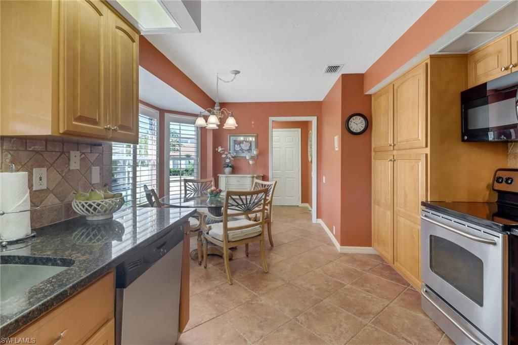 11745 Quail Village Way, Naples, FL 34119 Photo