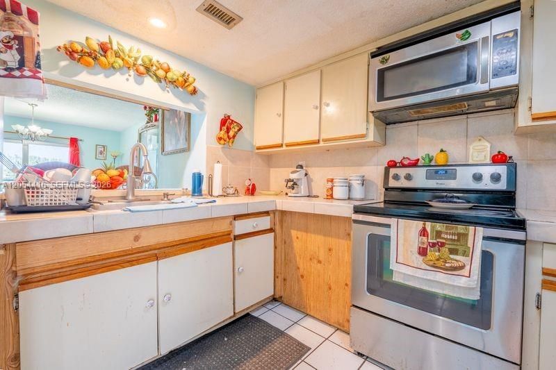 9917 W Okeechobee Rd, Unit 3-306, Hialeah Gardens, FL 33016 Photo