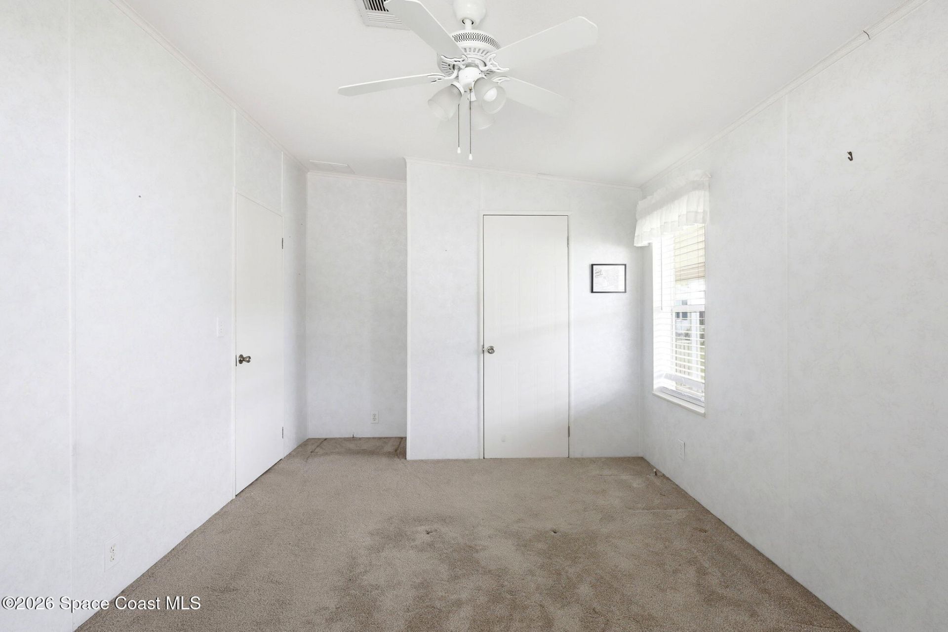 5374 Hammerstone Court , Unit M11, Micco, FL 32976 Photo