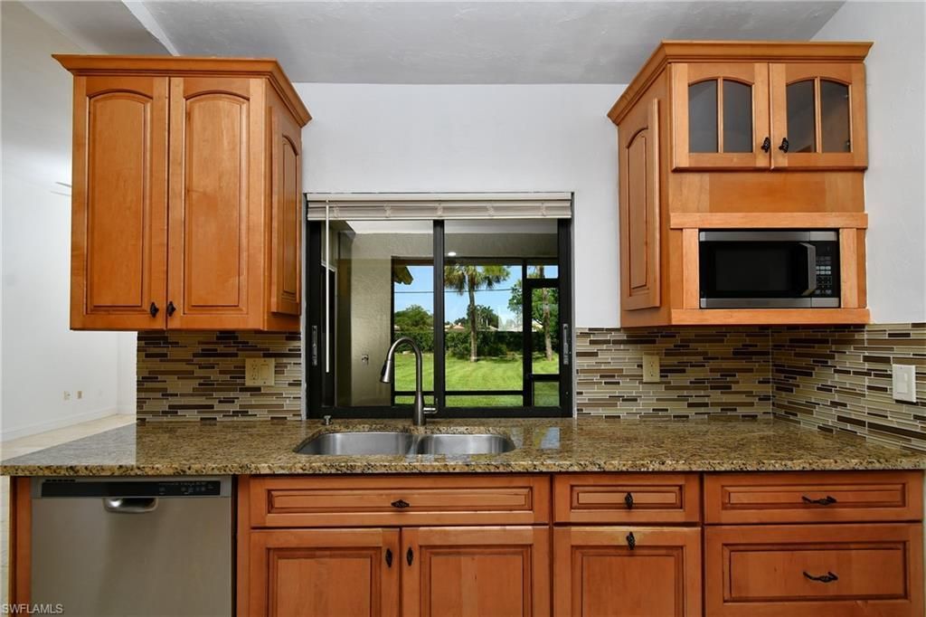 11477 Longshore Way W, Naples, FL 34119 Photo