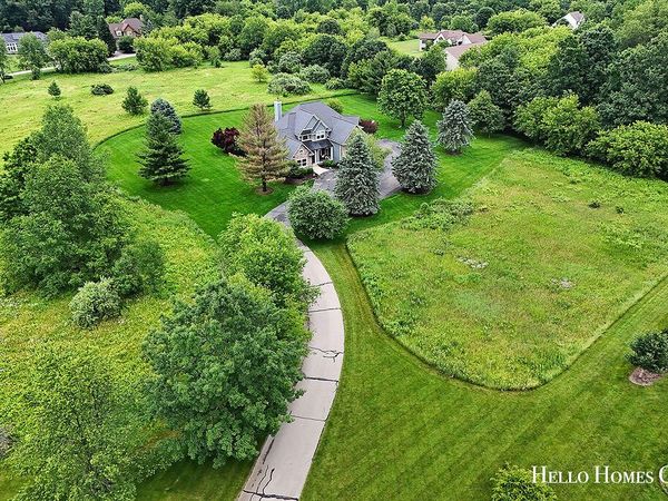 5335 Canyon River Drive NE, Ada, MI 49301
