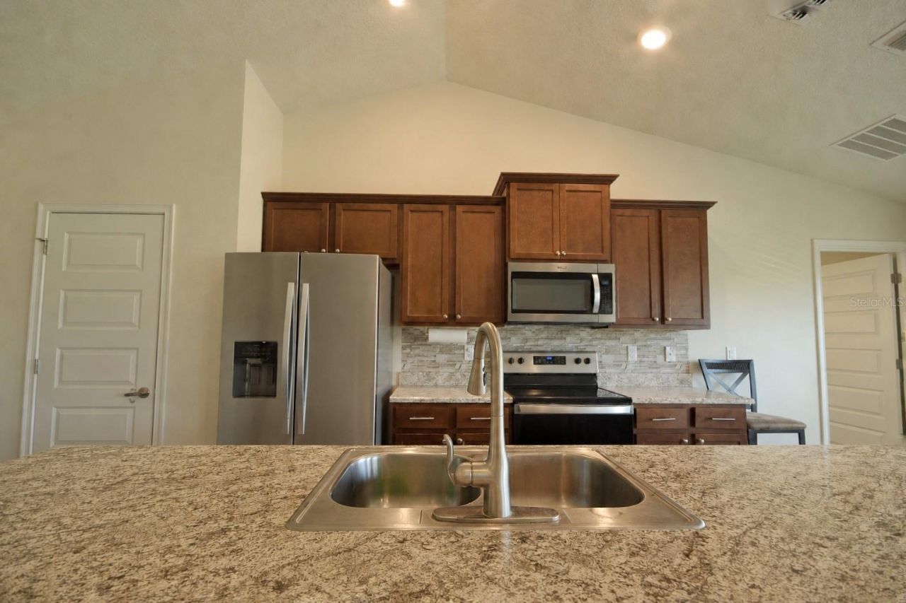 7733 Sloewood Drive , Leesburg, FL 34748 Photo