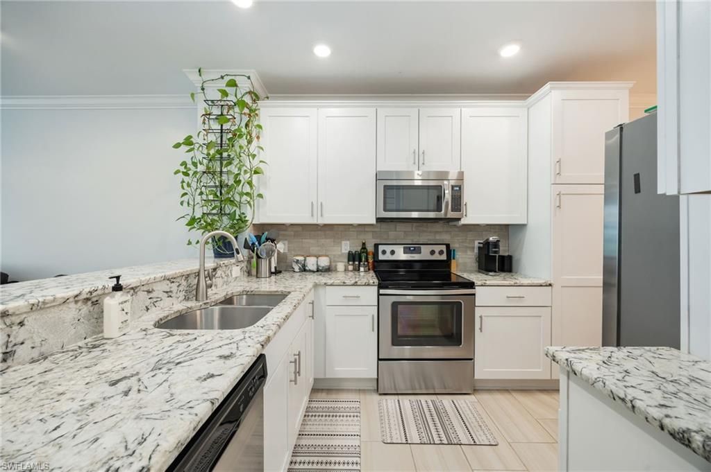 15122 Palmer Lake Cir , Unit 102, Naples, FL 34109 Photo