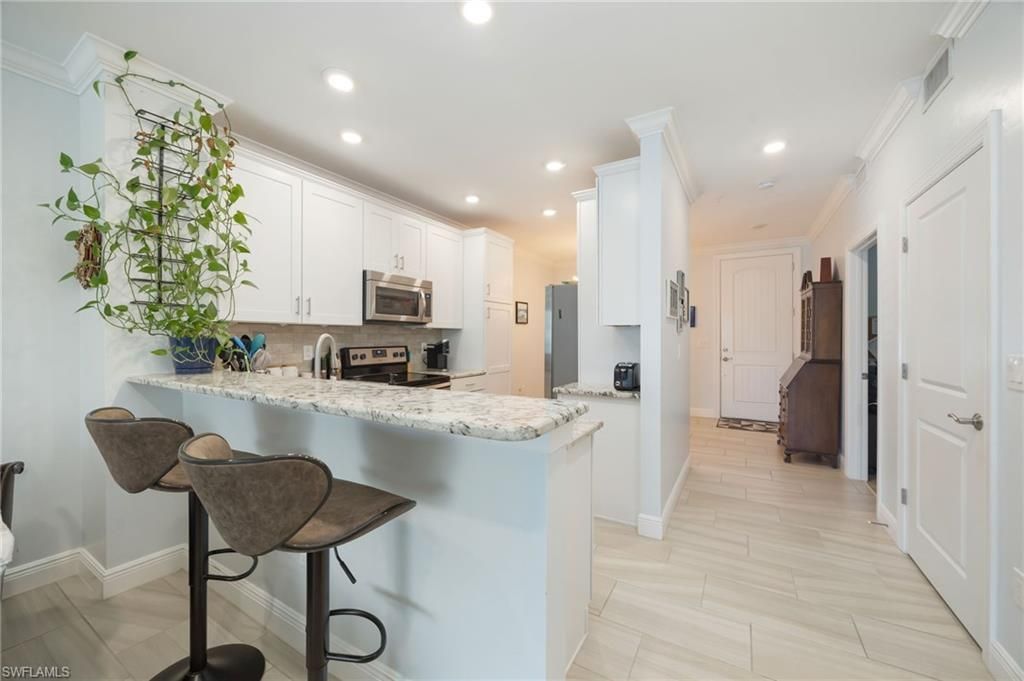 15122 Palmer Lake Cir , Unit 102, Naples, FL 34109 Photo