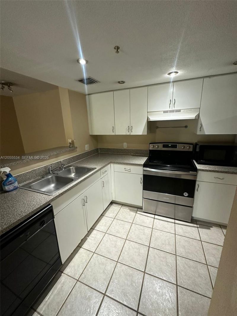 5035 Wiles Rd , Unit 203, Coconut Creek, FL 33073 Photo