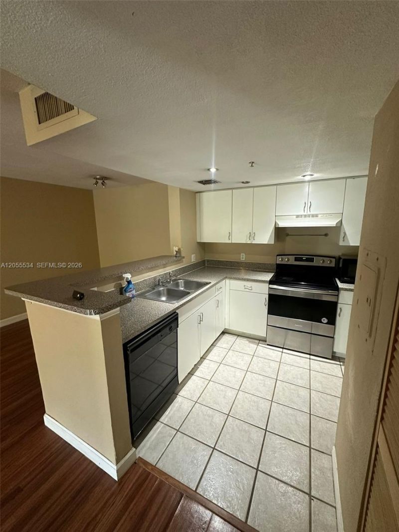 5035 Wiles Rd , Unit 203, Coconut Creek, FL 33073 Photo