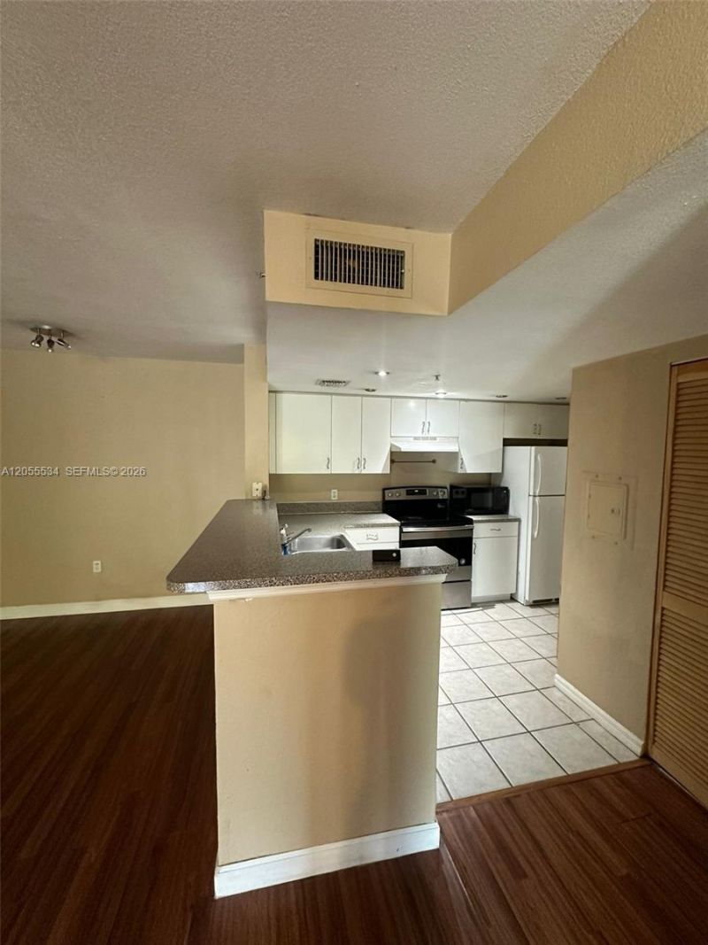 5035 Wiles Rd , Unit 203, Coconut Creek, FL 33073 Photo