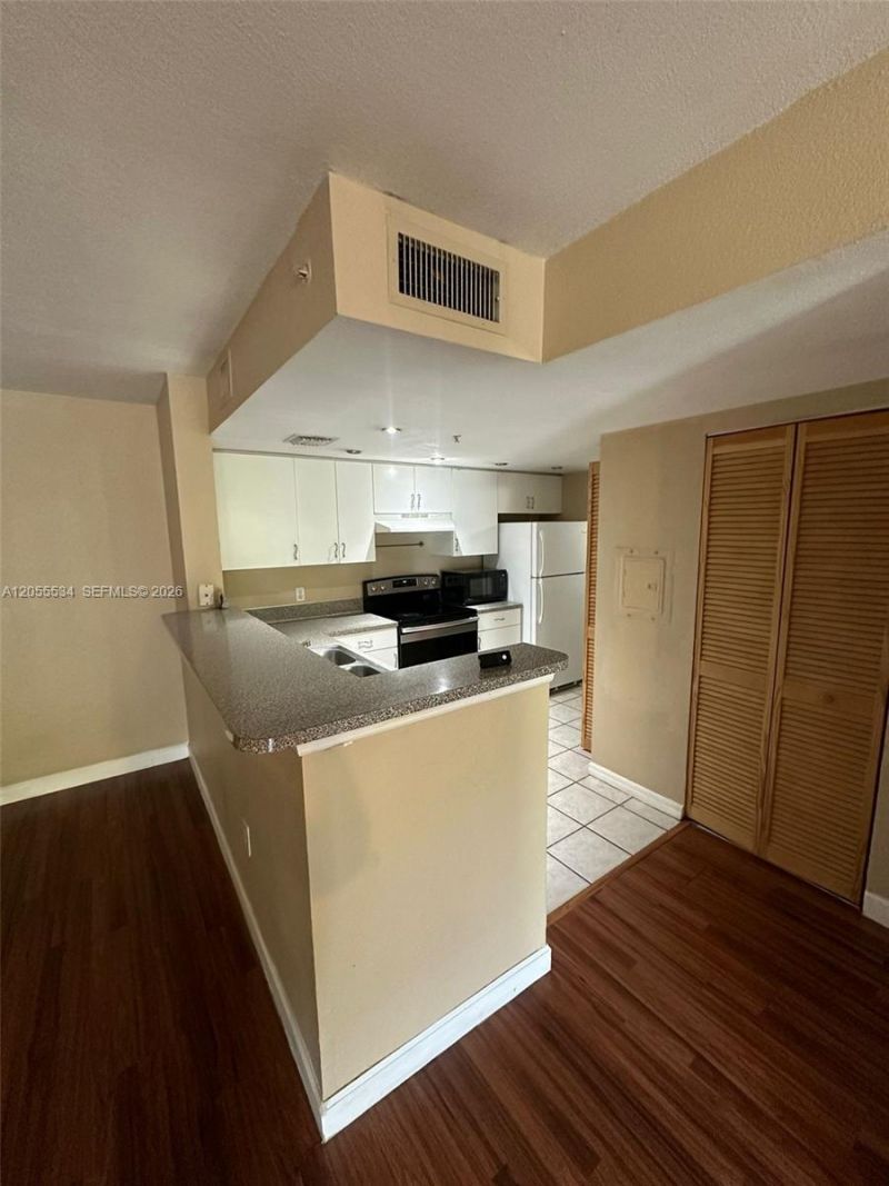 5035 Wiles Rd , Unit 203, Coconut Creek, FL 33073 Photo