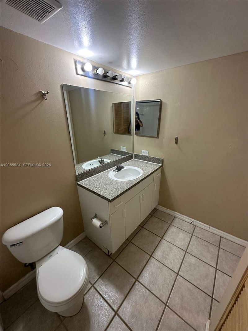 5035 Wiles Rd , Unit 203, Coconut Creek, FL 33073 Photo
