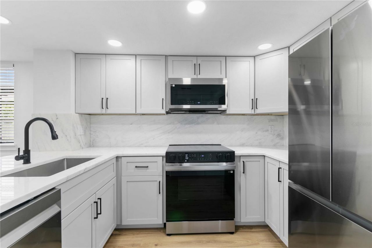 8711 Cobbler Place , Tampa, FL 33615 Photo