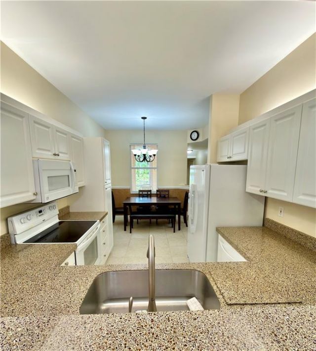 517 Robin Hood Cir, Unit 101, Naples, FL 34104 Photo