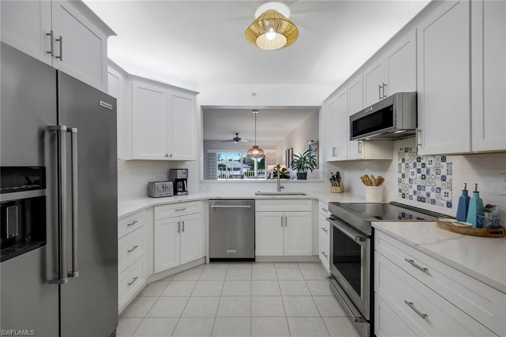 7822 Great Heron Way, Unit 201, Naples, FL 34104 Photo