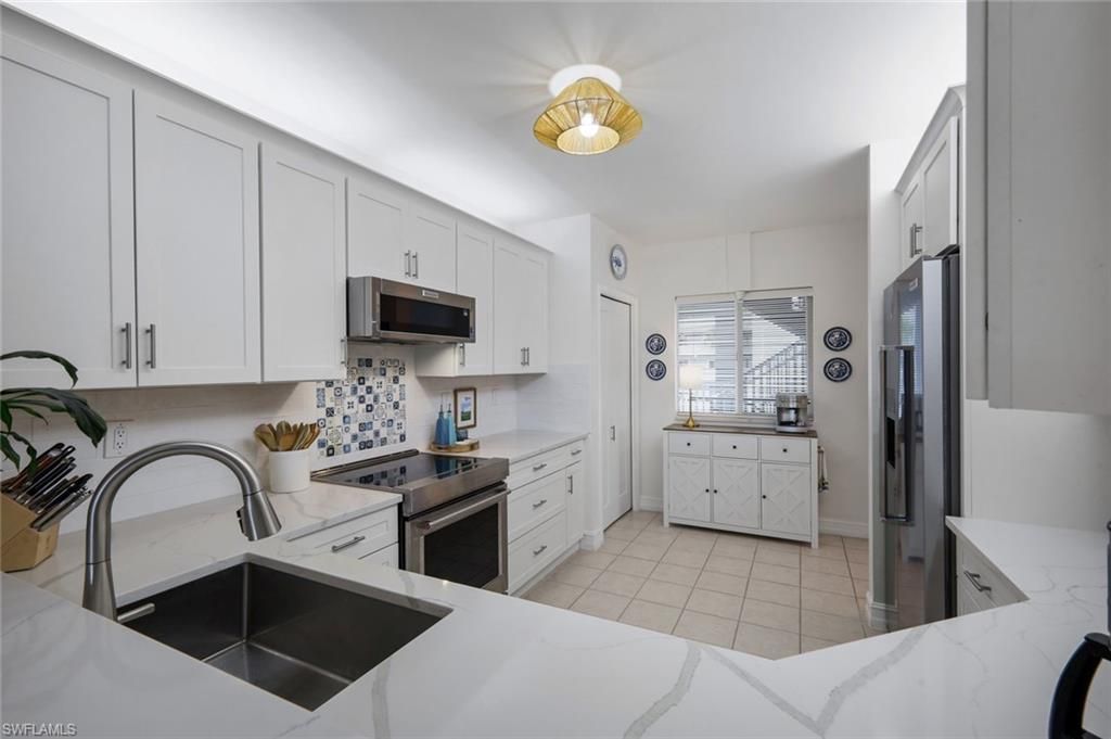 7822 Great Heron Way, Unit 201, Naples, FL 34104 Photo