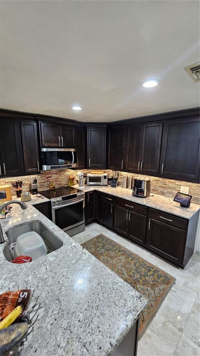 7252 Woodmont Ave , Tamarac, FL 33321 Photo