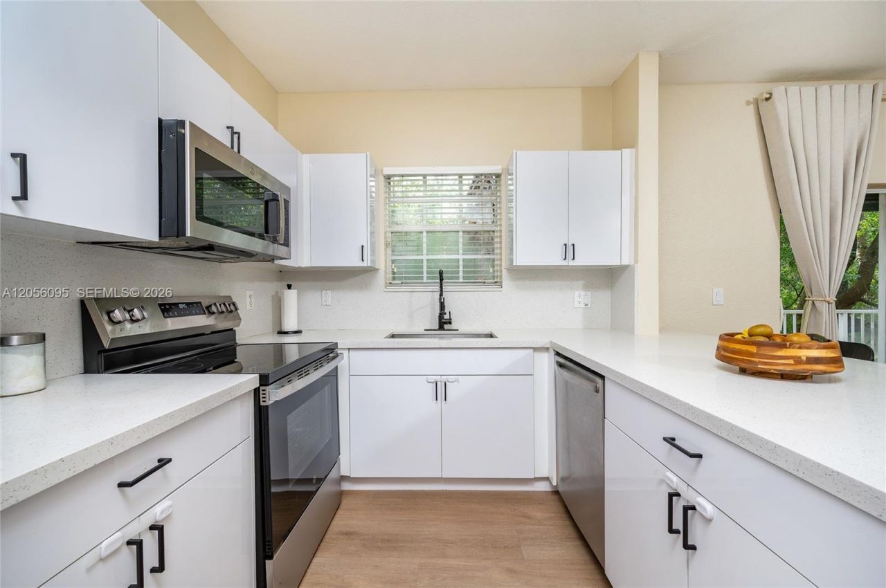 5600 NW 114th Pl , Unit 209, Doral, FL 33178 Photo