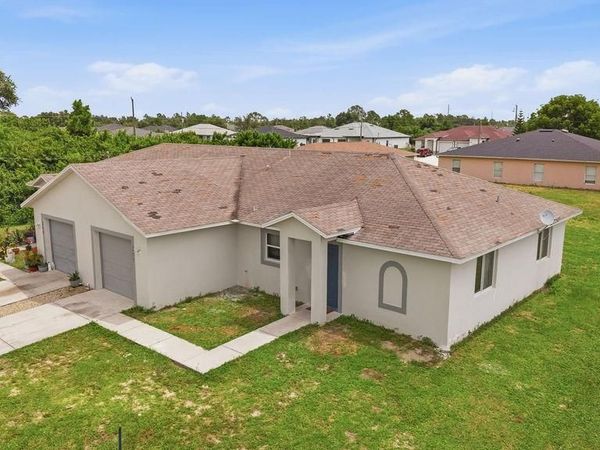 205/207 Homer AVE S, LEHIGH ACRES, FL 33973