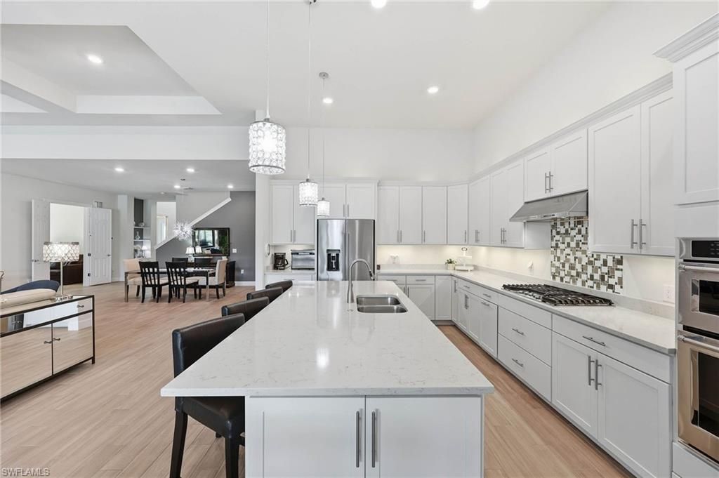 7759 Winding Cypress Dr, Naples, FL 34114 Photo