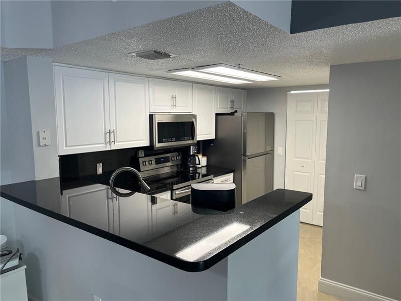 5051 Wiles Road, Unit 207, Coconut Creek, FL 33073 Photo