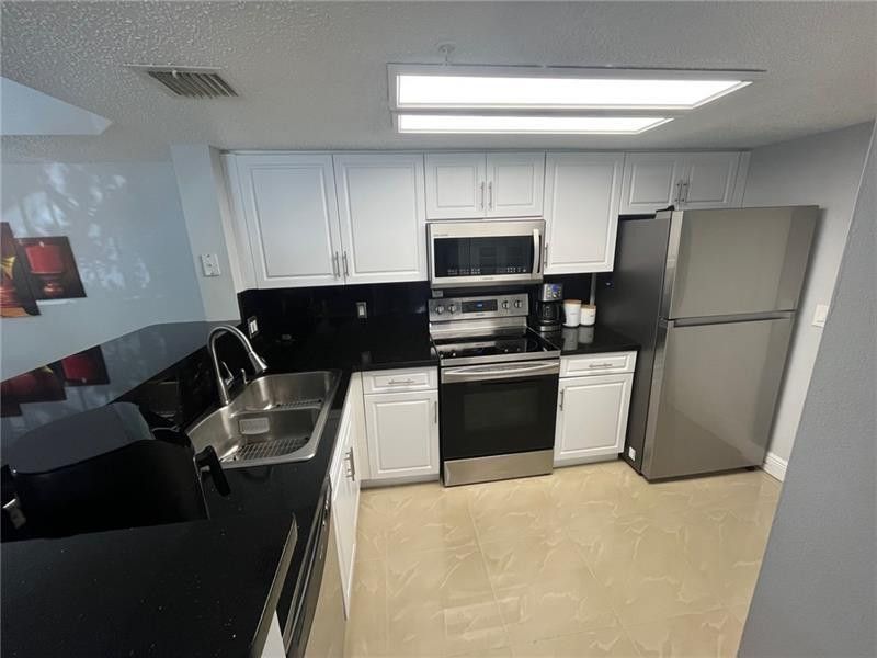 5051 Wiles Road, Unit 207, Coconut Creek, FL 33073 Photo