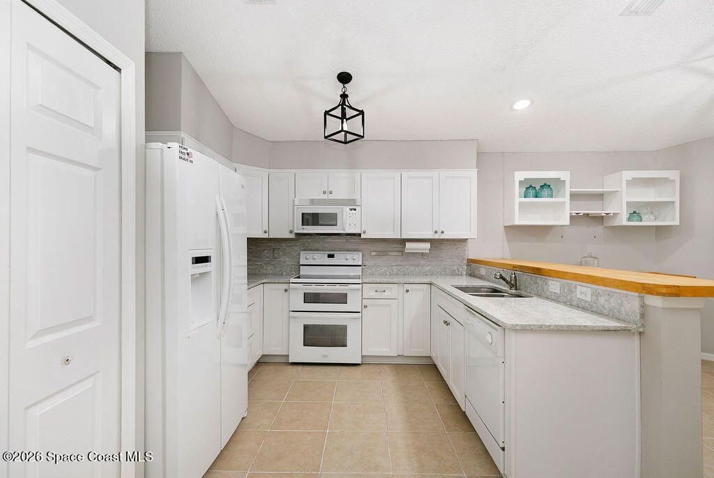 4511 Derbyshire Drive , Titusville, FL 32780 Photo
