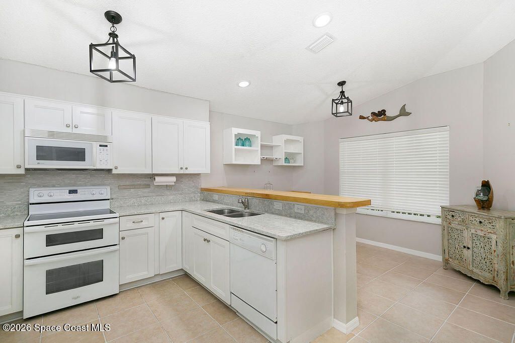 4511 Derbyshire Drive , Titusville, FL 32780 Photo