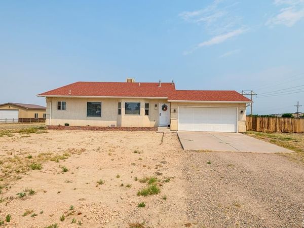 1467 W Plaza De Los Leones Dr, Pueblo West, CO 81007
