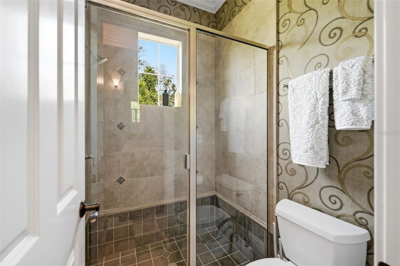 16028 Pendio Drive, Montverde, FL 34756 Photo